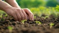 A person planting a seed in the dirt with their hands, AI