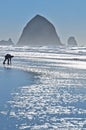 Person playing on Cannon beach