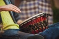 Person playing on Jambe Drum no face Royalty Free Stock Photo