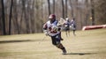 person playing lacrosse