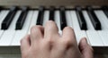 Person playing piano from a top view