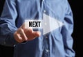 Person pointing at next button for future growth Royalty Free Stock Photo