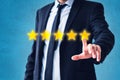 Person pointing on 5 star review, costumer feedback concept - five stars rating