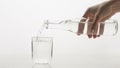 Person pouring water glass. High quality and resolution beautiful photo concept Royalty Free Stock Photo