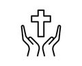 Person praying with cross in hand - concept of a devout christian worshiping Christ