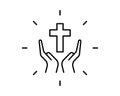 Person praying with cross in hand - concept of a devout christian worshiping Christ