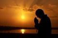 Person praying god sunset. Generate Ai