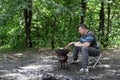 Person preparing barbecue