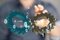 Person presenting a 3D rendering digital gears for business success