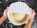 Person proofing dough under clothing
