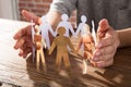 Person Protecting Paper Cut Out Figure Royalty Free Stock Photo