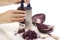 Person rasping red cabbage Royalty Free Stock Photo