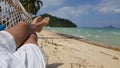 Person relaxing in a hammock