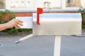 Person Removing Letters From Mailbox Royalty Free Stock Photo