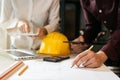 Architects discussing at the table, team work and work flow construction concept. Royalty Free Stock Photo