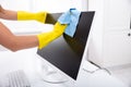 Person`s Hand Cleaning Desktop Screen Royalty Free Stock Photo