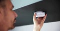 Person's Hand Installing Smoke Detector On Ceiling Wall Royalty Free Stock Photo