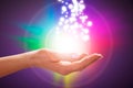 Person`s Hand Into Magical Healing Energy Field