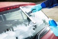 Person`s Hand Washing Rear Windshield