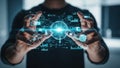 Person holding a glowing holographic globe with interconnected data and charts technology Royalty Free Stock Photo
