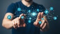 Person\'s hands interacting with a glowing blue network of interconnected nodes and digital data points Keywords Royalty Free Stock Photo