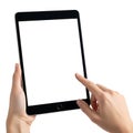 Hands holding a modern black tablet device with a blank white screen isolated on white background Royalty Free Stock Photo