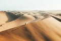 Person on sand dune in desert sunset of Huacachina, Ica, Peru, South America Royalty Free Stock Photo