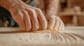 A person is sanding wood with a hand held tool, AI