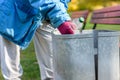 Person scrounging through a bin Royalty Free Stock Photo