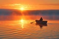 A person is seen rowing a boat on a tranquil lake as the sun sets, casting a warm glow across the water, A sunrise over a calm Royalty Free Stock Photo