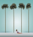 A person is seen on a white sand beach with very tall slender palm trees and the ocean in the background. This is an illustration