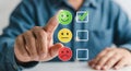 Person selecting happy face icon with checkmark on screen survey feedback Royalty Free Stock Photo