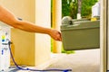 Person serving caravan, tank toilet cassette in dump station Royalty Free Stock Photo