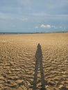 Person shadow on the beach