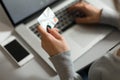 Person shopping making Payment at Computer using Credit Card Royalty Free Stock Photo