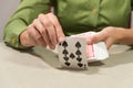 person shuffling cards for a card game Royalty Free Stock Photo