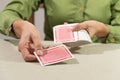 person shuffling cards for a card game Royalty Free Stock Photo