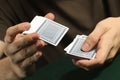 Person Shuffling a Deck of Cards Royalty Free Stock Photo