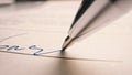 Person Signing Important Document. Camera Following Tip of the Pen as it Signs Crucial Business Co Royalty Free Stock Photo