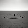Dreamlike Installation: Minimalist Sculpture In Expansive Desert Landscape
