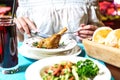 Person Cutting Chicken on Plate Royalty Free Stock Photo