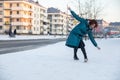 A person slipped on the snow and injured her ankle.