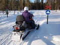 Person on a snow scooter Royalty Free Stock Photo