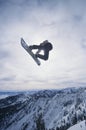 Person On Snowboard Jumping Midair Royalty Free Stock Photo
