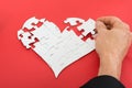 Person Solving Heartshape Jigsaw Puzzle Royalty Free Stock Photo