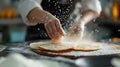 A person sprinkling flour on a plate of pancakes, AI