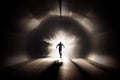 person, sprinting through tunnel of light, with blurred motion and dramatic lighting Royalty Free Stock Photo