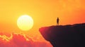 a person standing on a cliff looking at the sun Royalty Free Stock Photo