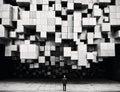 a person is standing in the middle of a room filled with cubed blocks