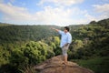 Person on the rock. Sport and active life  a man on a mountain top concept. Beauty world. Royalty Free Stock Photo